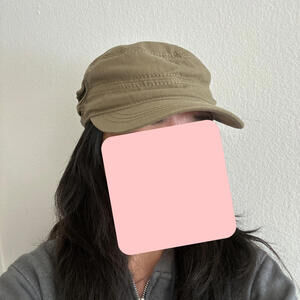 Green pageboy hat with pocket on side